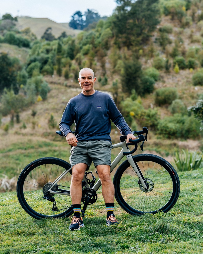 Corey Rix outdoors with his bike