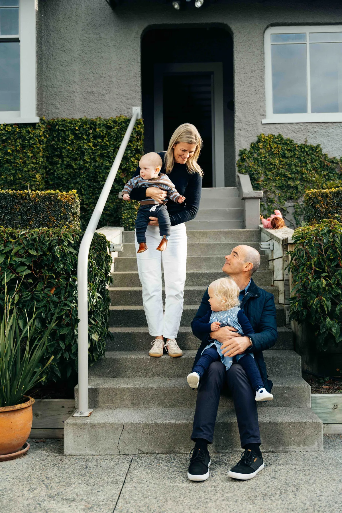 Corey Rix with his partner and children